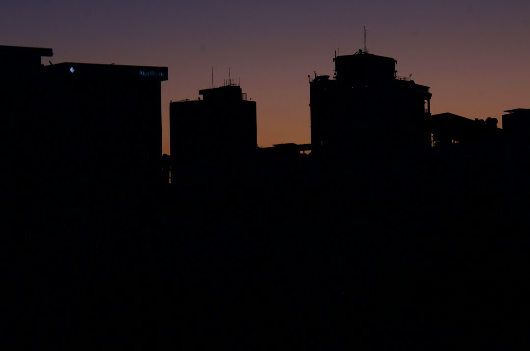 modern city skyline at dusk
